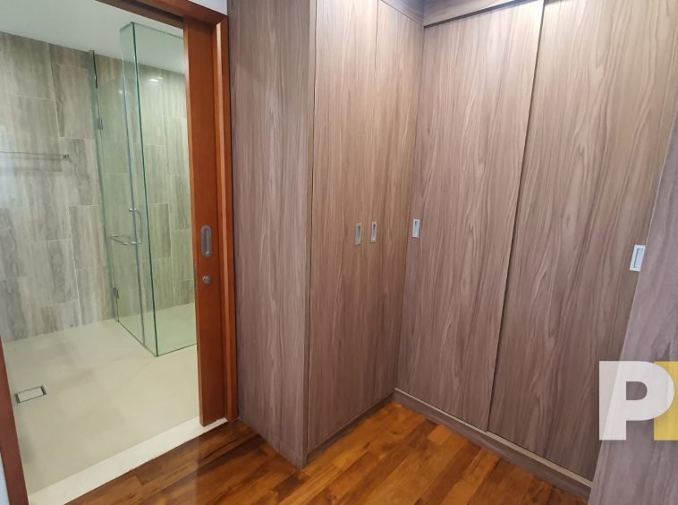 bedroom with wardrobe - property in Yangon