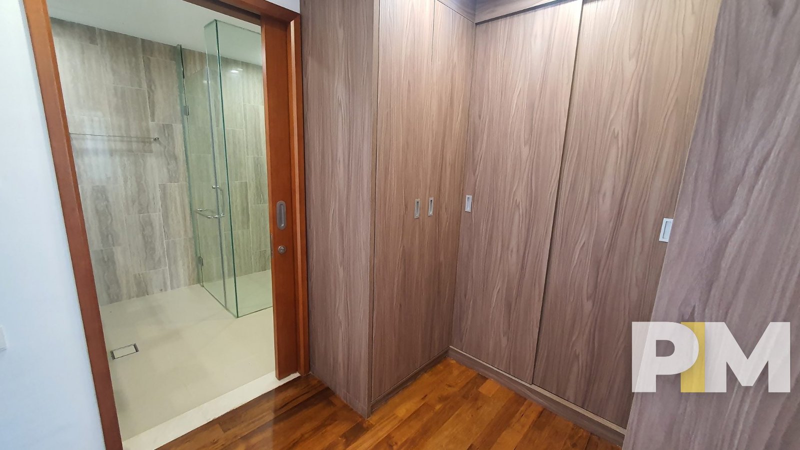 bedroom with wardrobe - property in Yangon