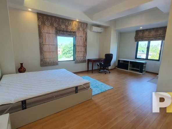 bedroom with working desk - properties in Yangon