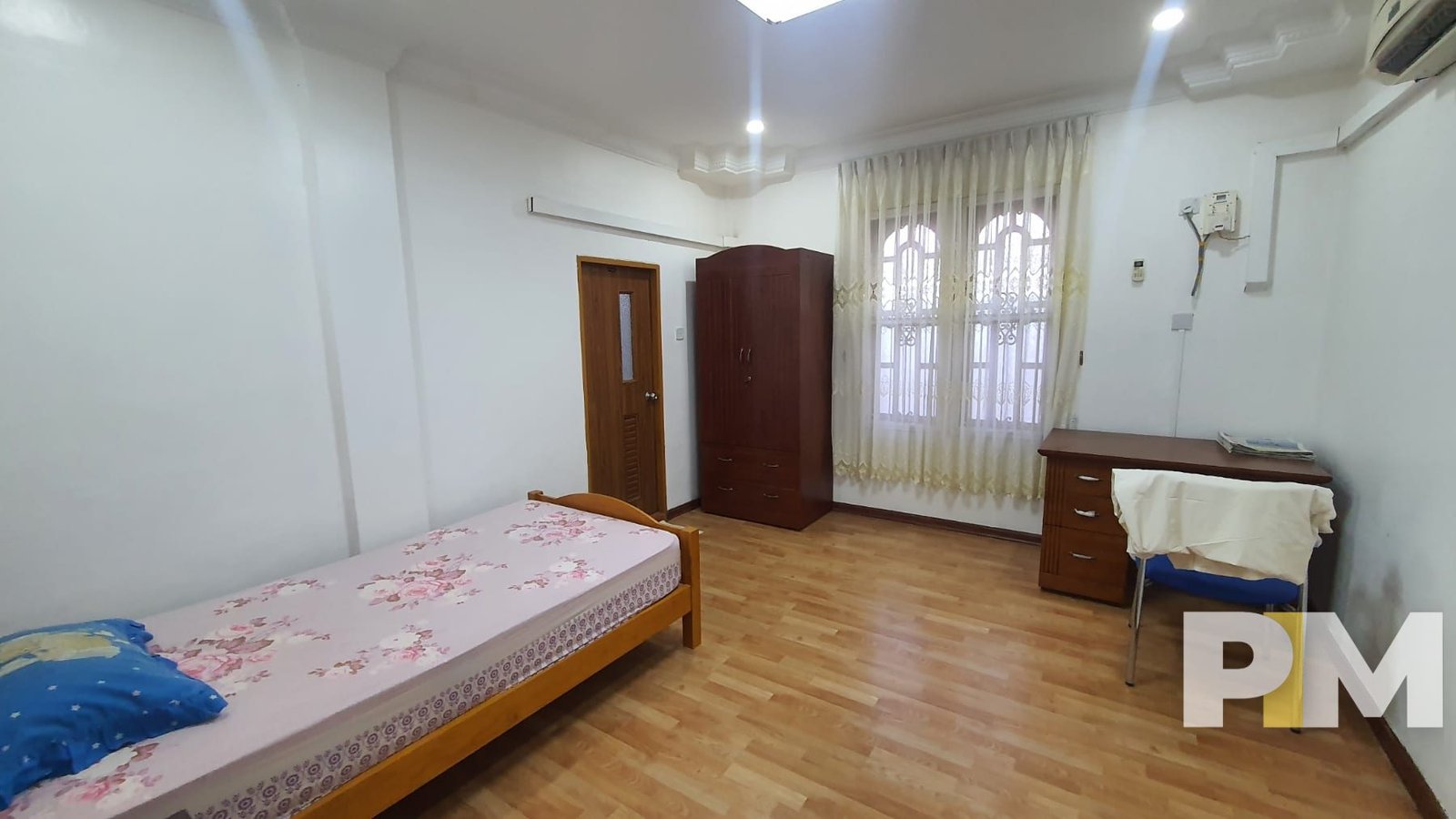 bedroom with working desk - property in Yangon