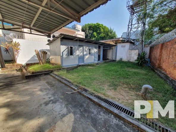 courtyard with a small building - properties in Yangon