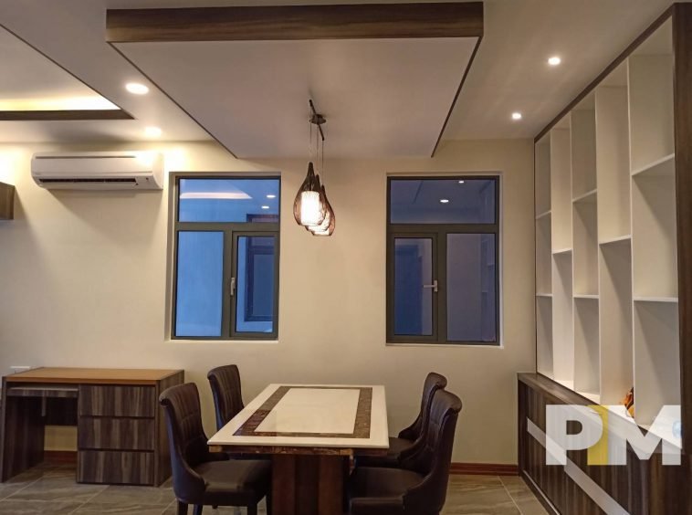 dining room with hanging light - properties in Yangon