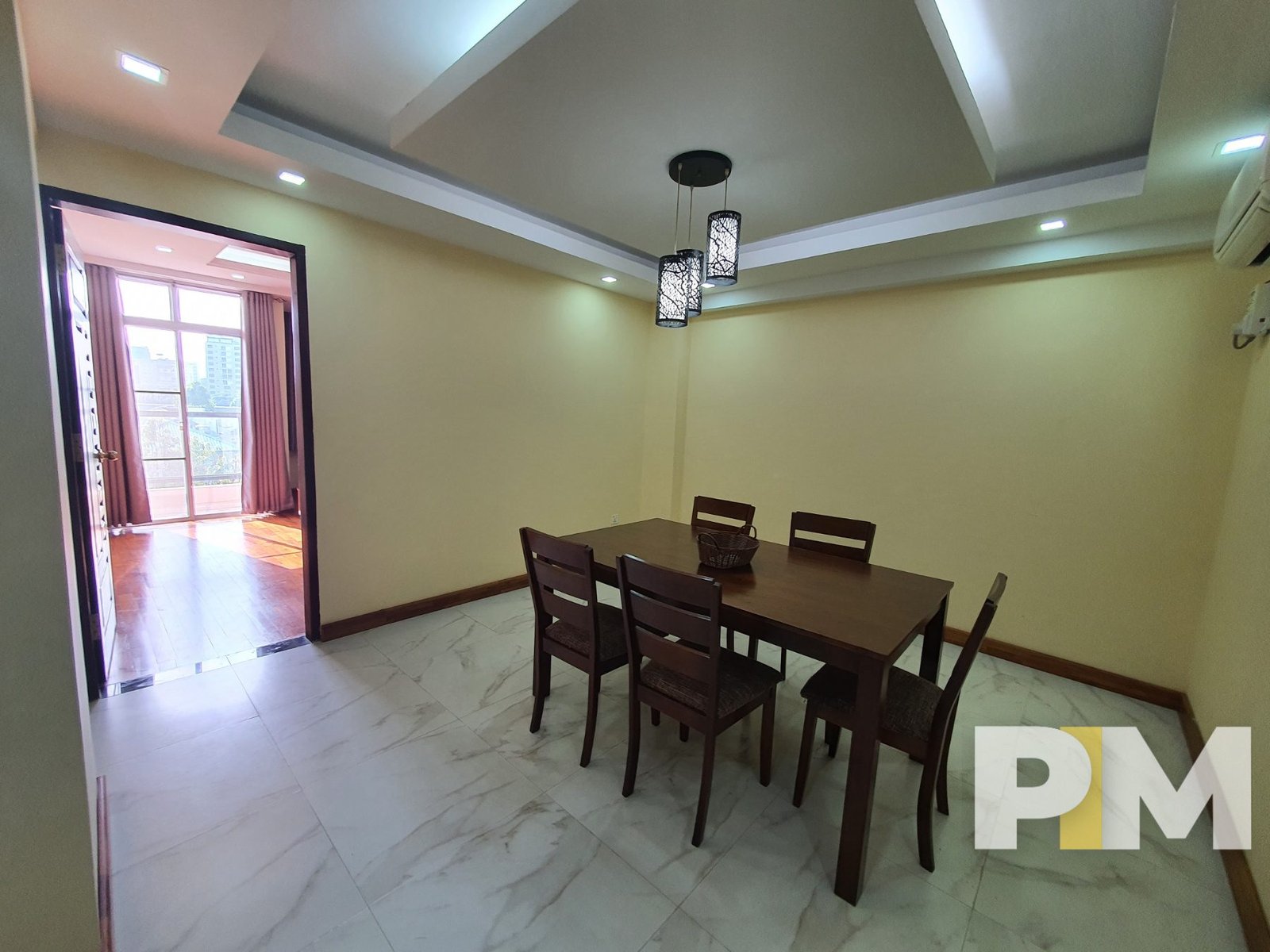 dining room with table and chairs - Yangon Property
