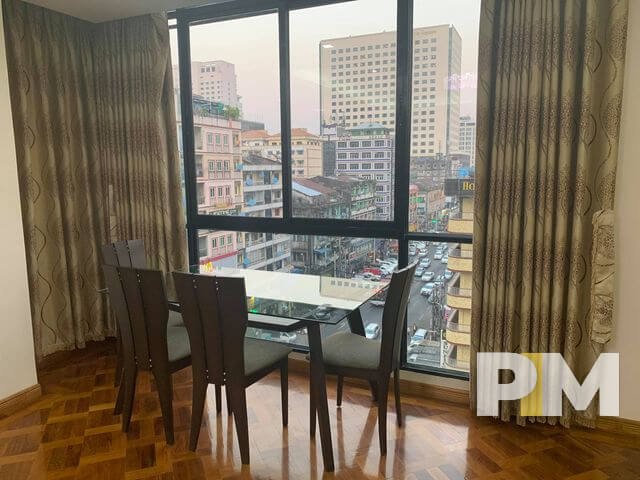 dining room with table and chairs - property in Myanmar