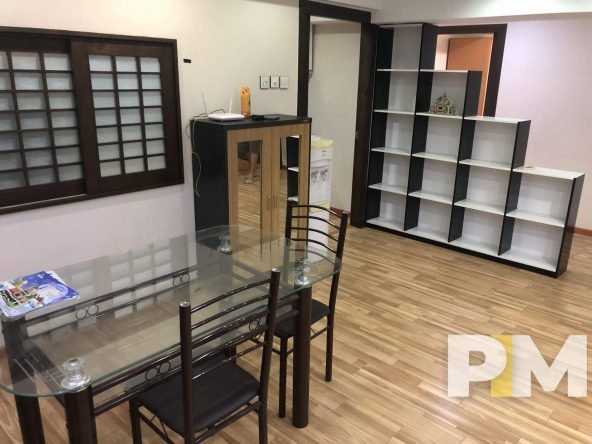 dining room with table and chairs - property in Yangon