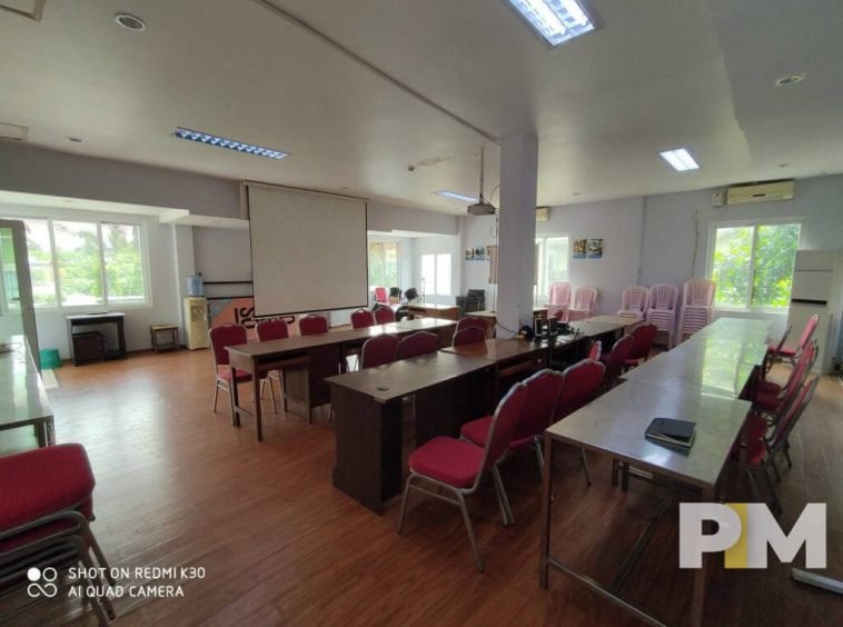 dining room with tables and chairs - Yangon Real Estate