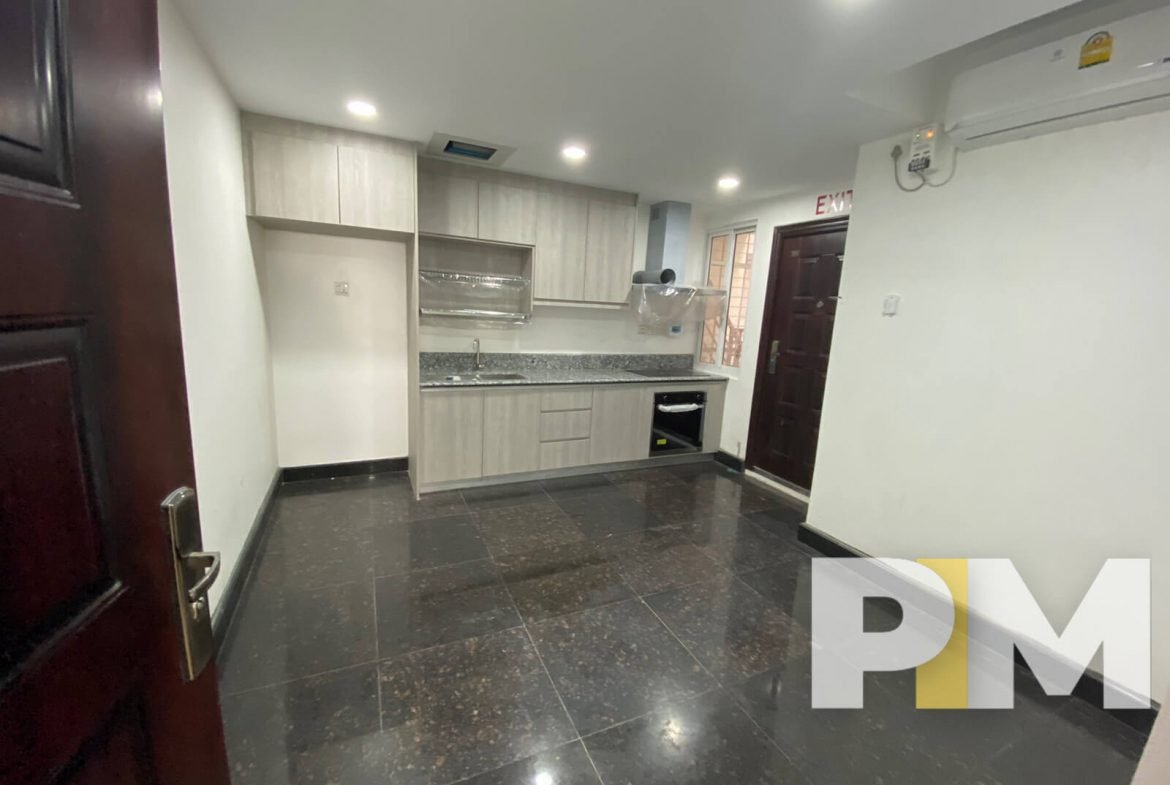 kitchen with cabinets - Condo for rent in Yawmingyi