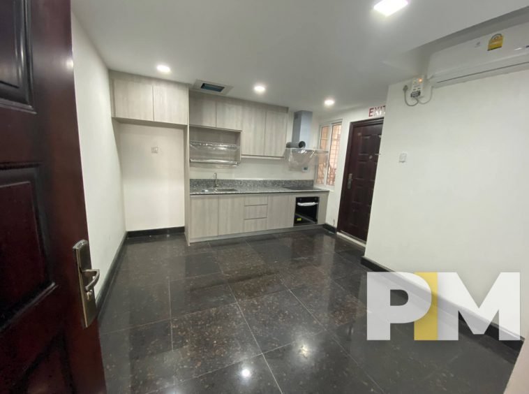 kitchen with cabinets - Condo for rent in Yawmingyi