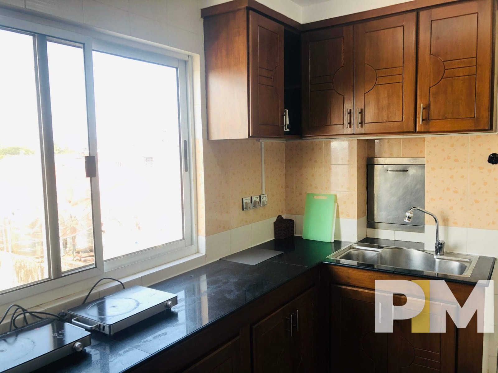 kitchen with cabinets - Condo for rent in Yawmingyi