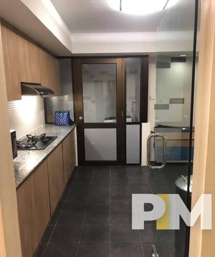 kitchen with cabinets - Condo for rent in Yawmingyi