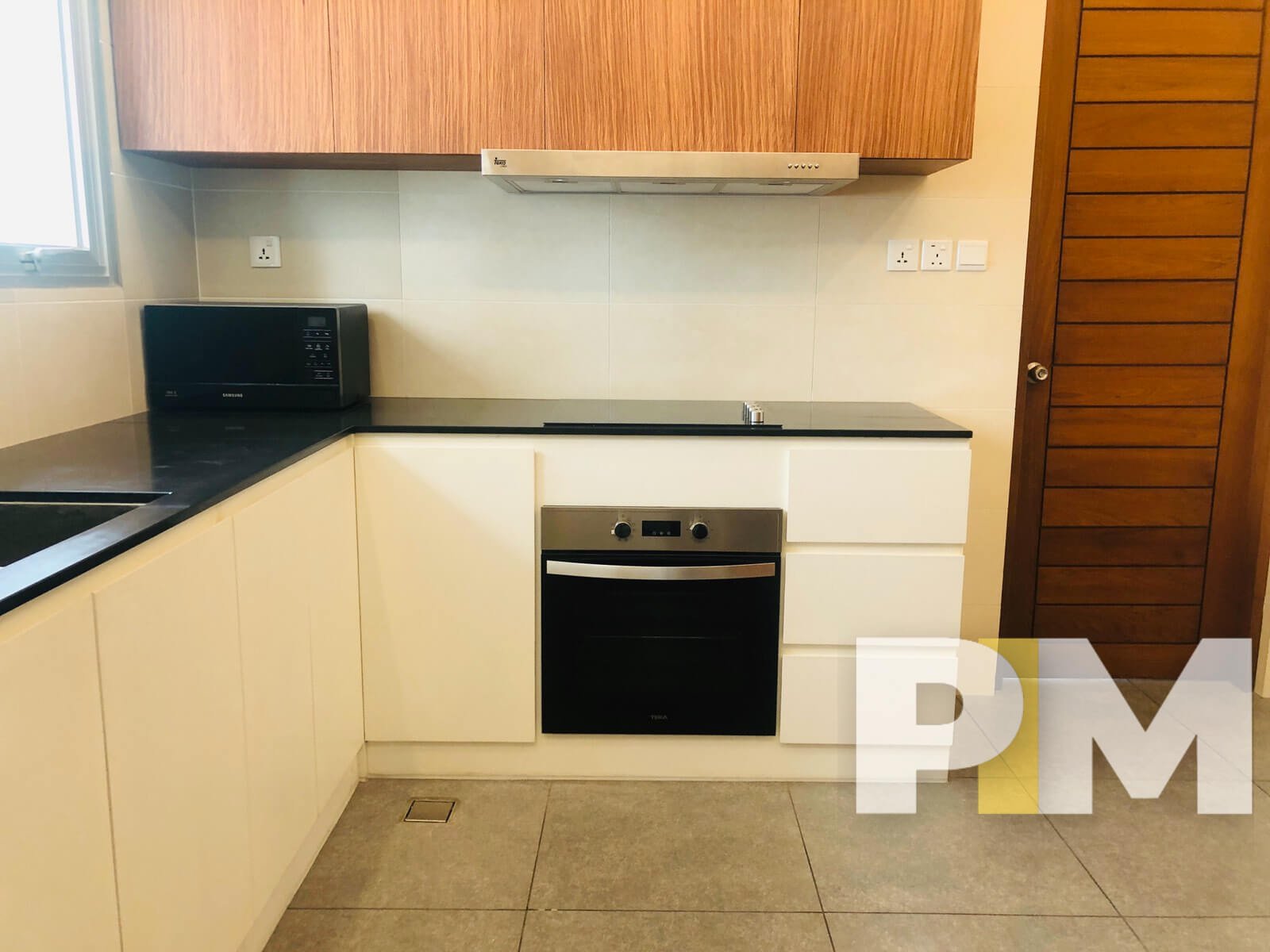 kitchen with cabinets - Home Rental Yangon