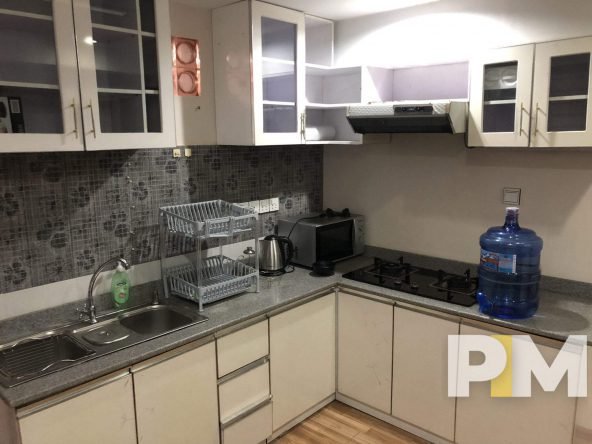 kitchen with cabinets - Home Rental Yangon