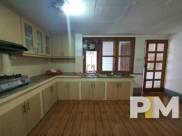 kitchen with cabinets - Home Rental Yangon