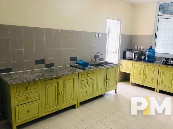 kitchen with cabinets - Home Rental Yangon