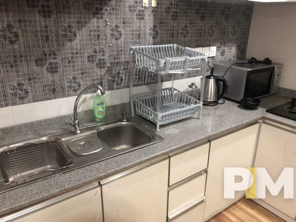 kitchen with cabinets - Myanmar Property