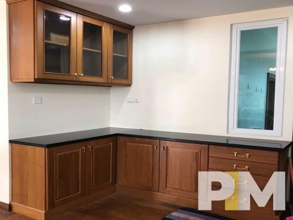 kitchen with cabinets - Myanmar Property