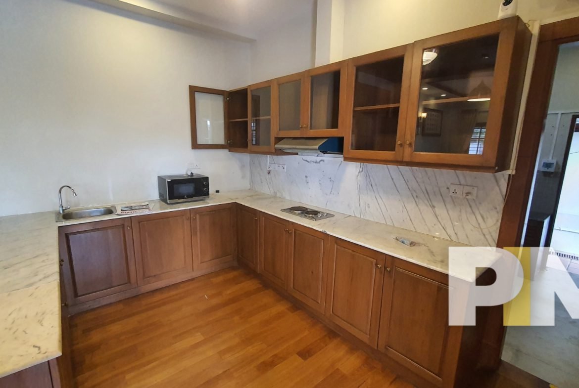kitchen with cabinets - Yangon Property