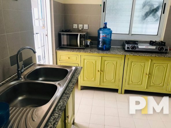kitchen with cabinets - Yangon Property