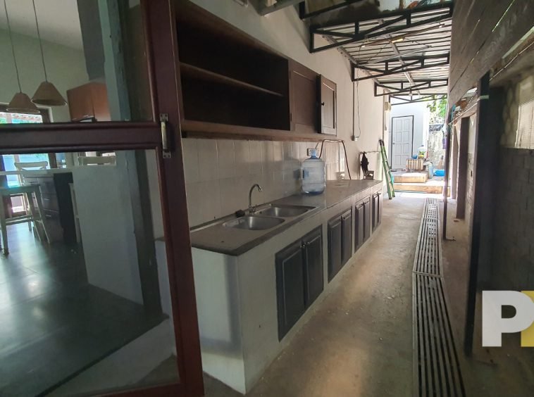 kitchen with cabinets - house for rent in Kamayut