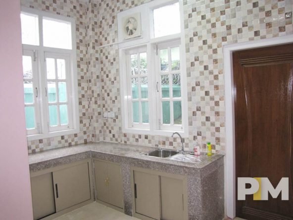 kitchen with cabinets - properties in Yangon