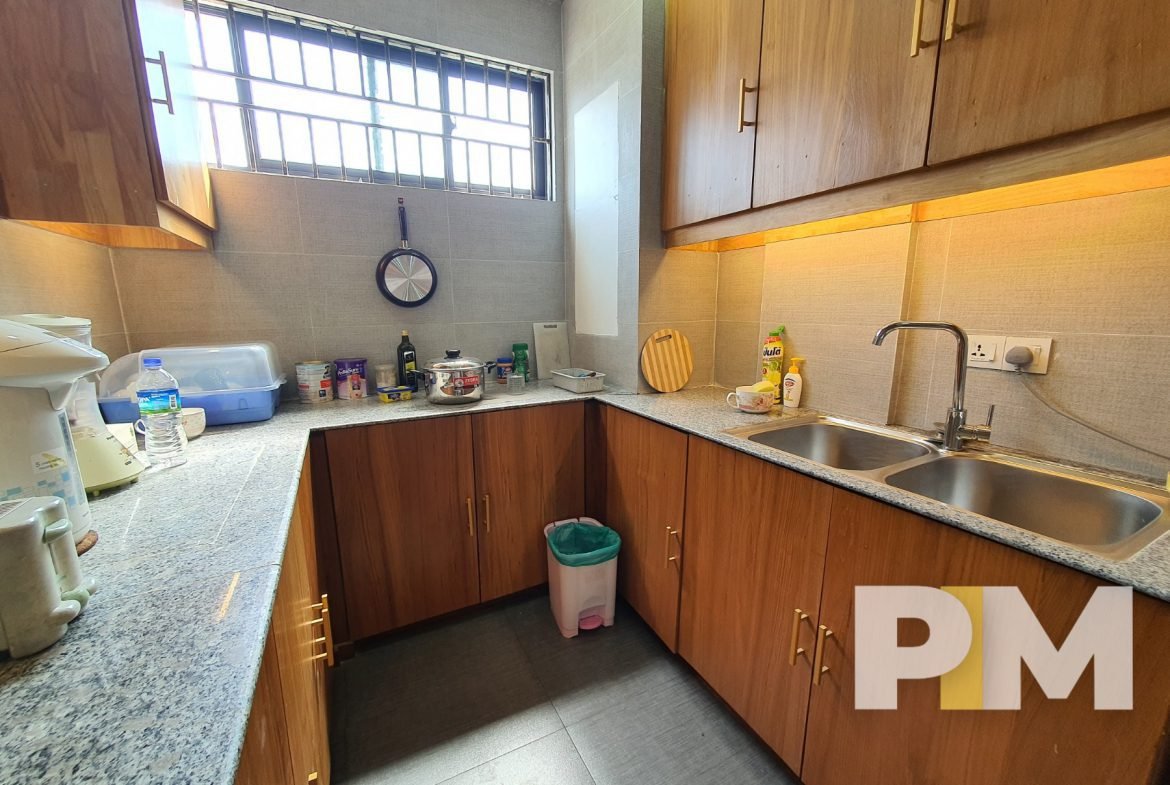 kitchen with cabinets - properties in Yangon