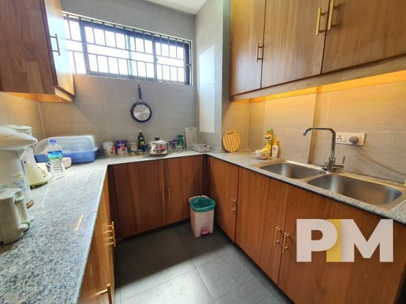 kitchen with cabinets - properties in Yangon