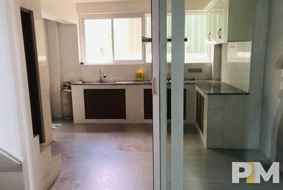 kitchen with cabinets - property in Yangon