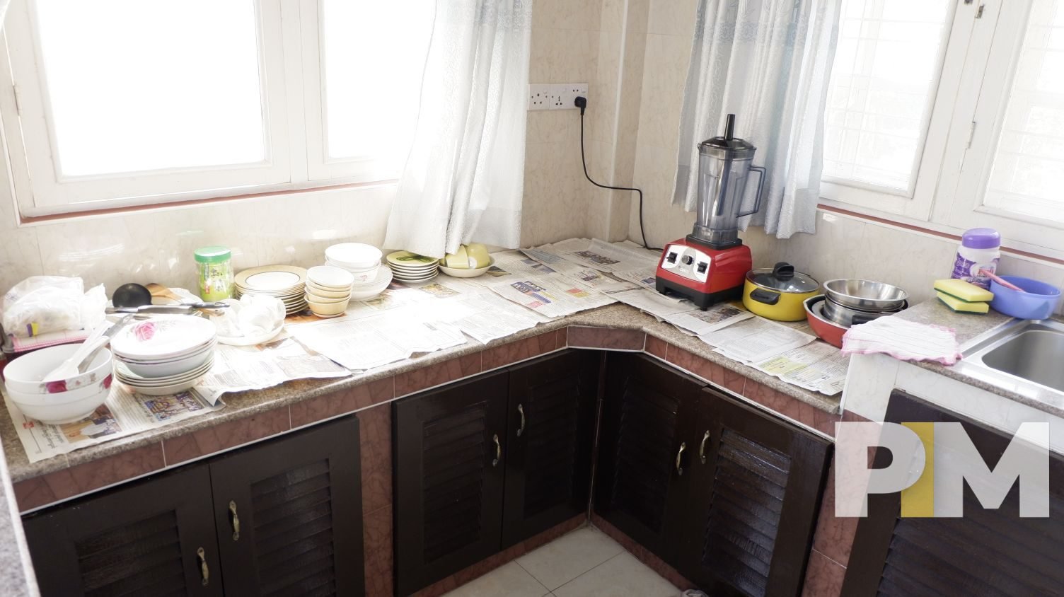 kitchen with cabinets - property in Yangon