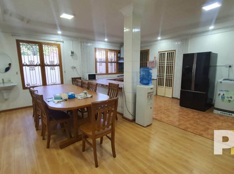 kitchen with dining table and chairs- property in Yangon