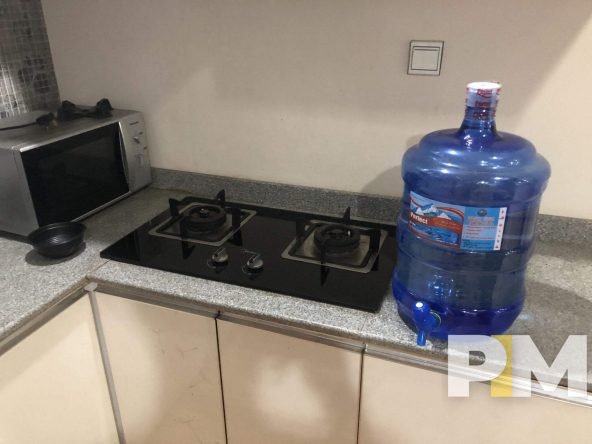 kitchen with electric stove - Rent in Yangon