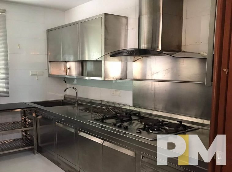 kitchen with electric stove - Yangon Property