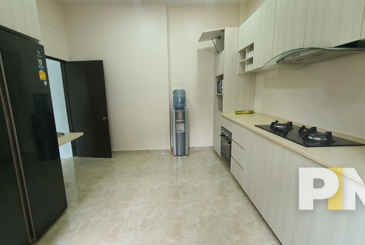 kitchen with electric stove - Yangon Real Estate