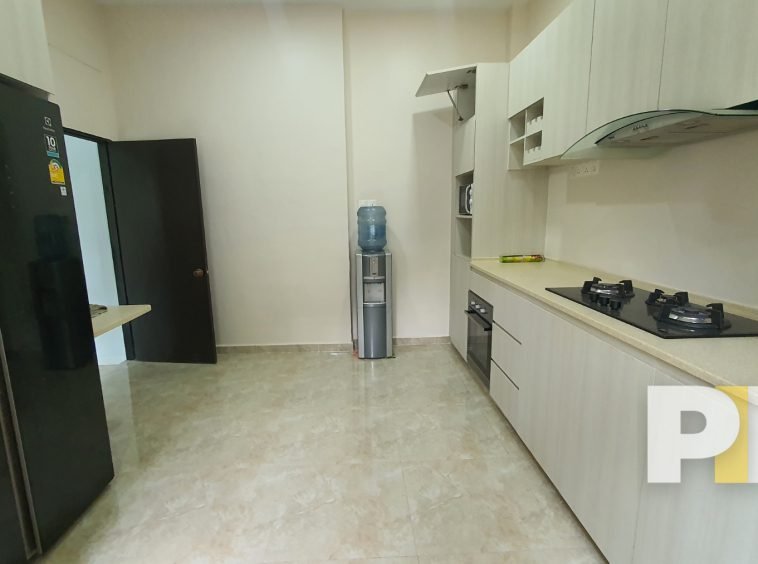 kitchen with electric stove - Yangon Real Estate