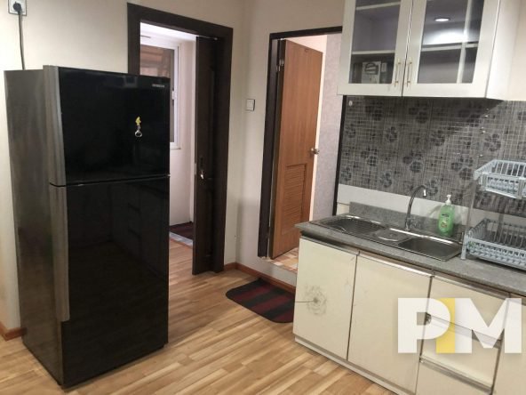 kitchen with fridge - Condo for rent in Yawmingyi