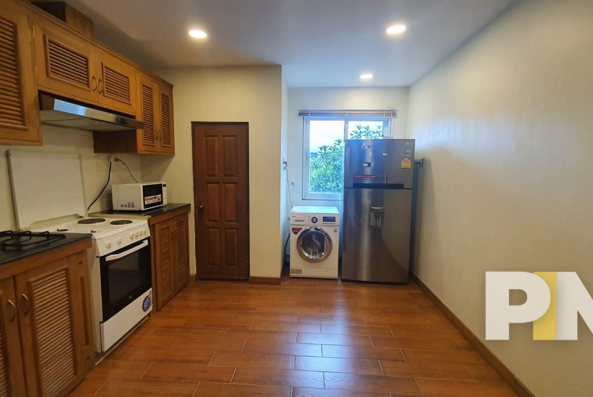 kitchen with fridge - Rent in Yangon