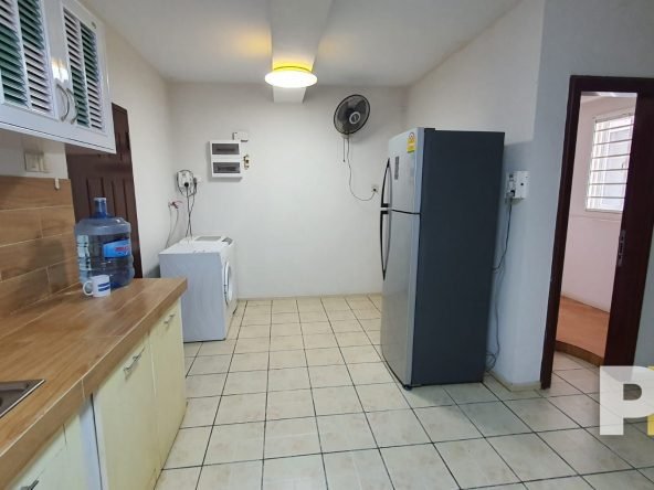 kitchen with fridge - property in Yangon