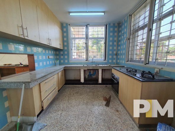 kitchen with stove - Home Rental Yangon