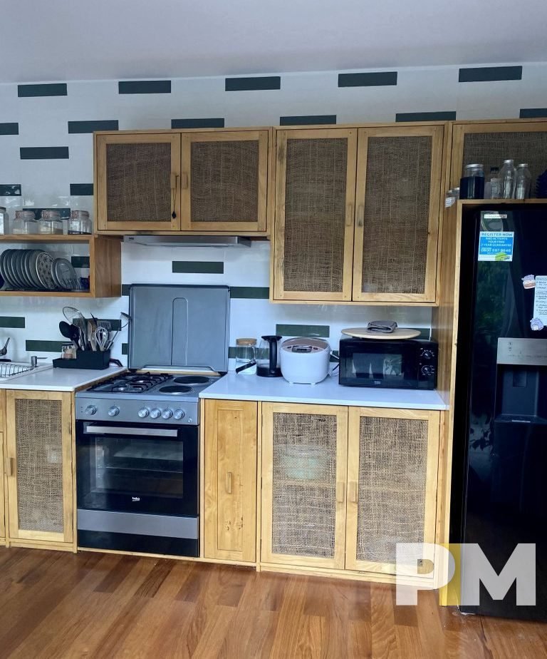 kitchen with stove - Myanmar Property