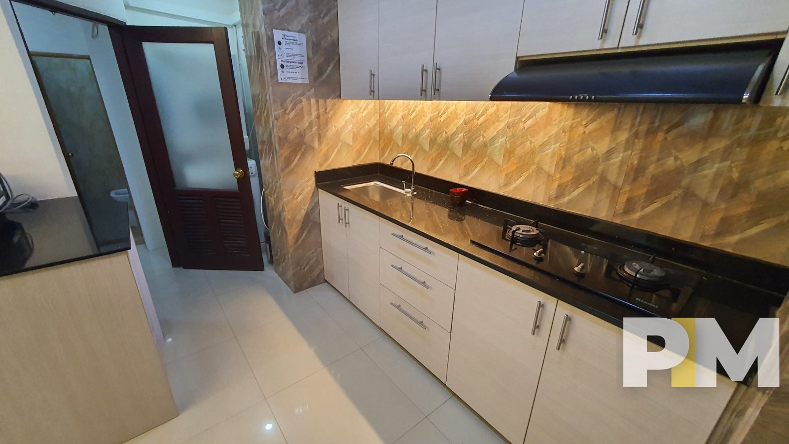 kitchen with stove - Rent in Yangon