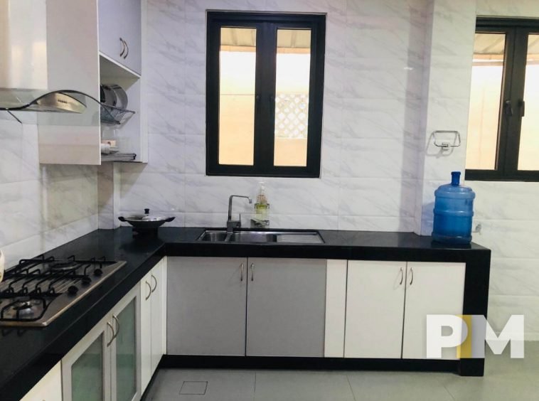 kitchen with stove - properties in Yangon