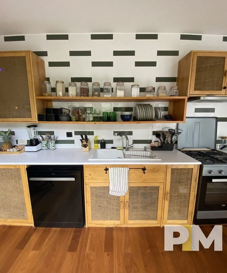 kitchen with stove - property in Yangon