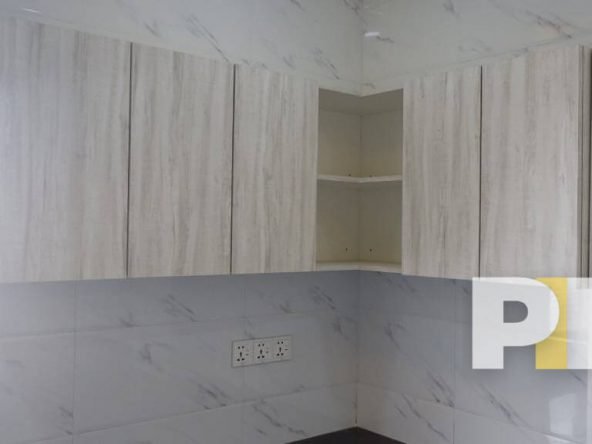 kitchen with wall cabinets - Rent in Yangon