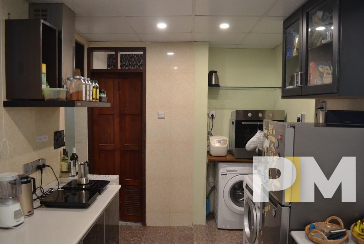 kitchen with washing machine - properties in Yangon