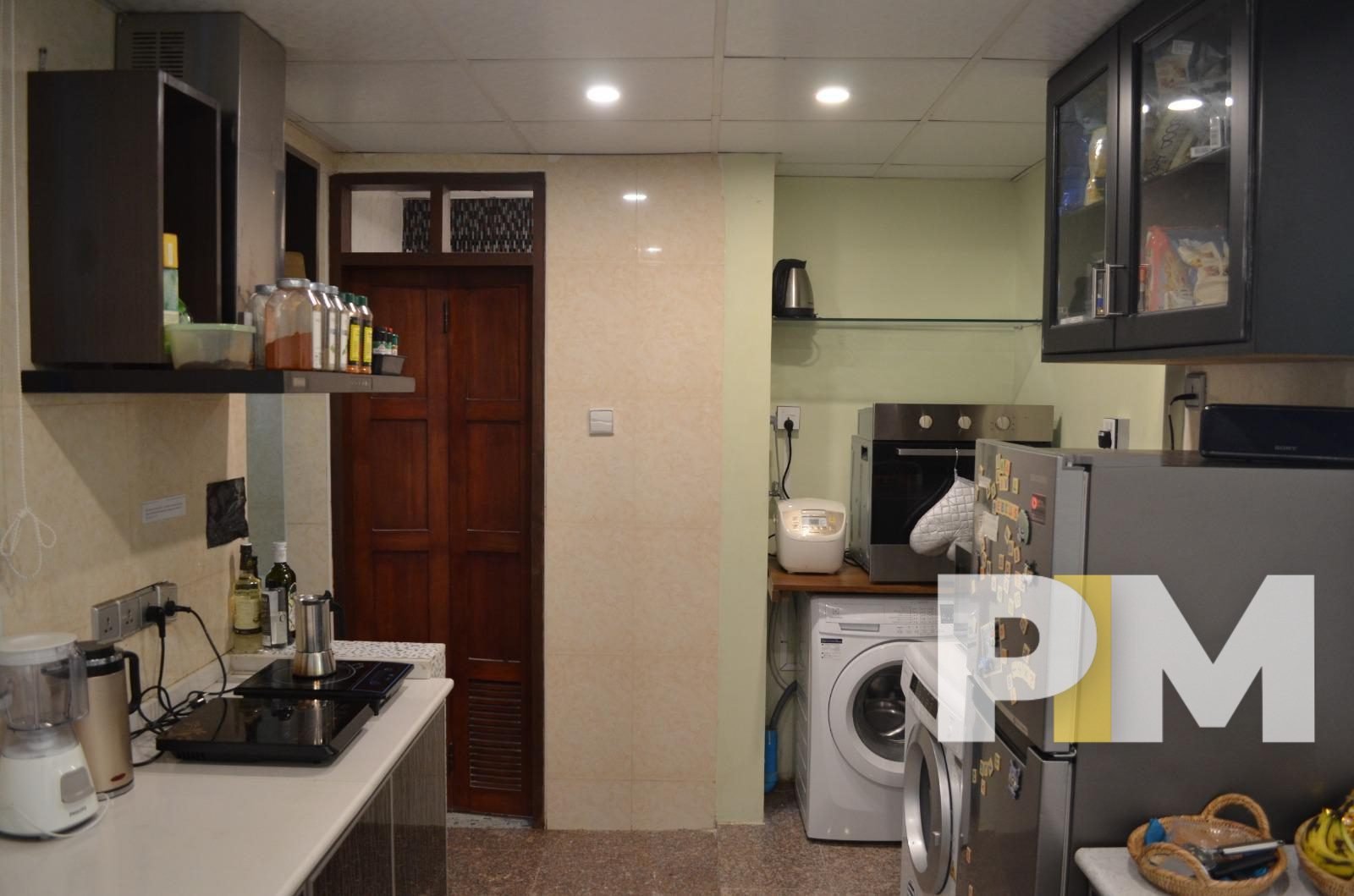 kitchen with washing machine - properties in Yangon