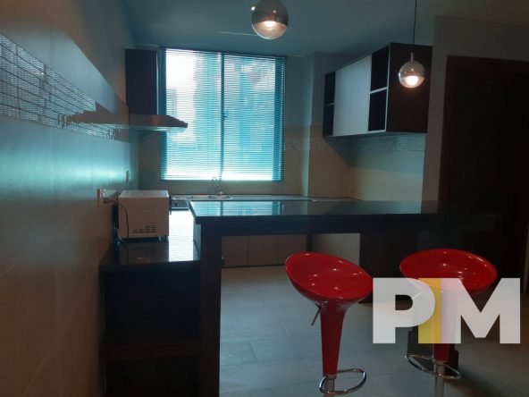 kitchen with wine chairs - Home Rental Yangon