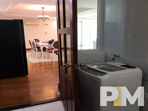 laundry room with washing machine - Home Rental Yangon