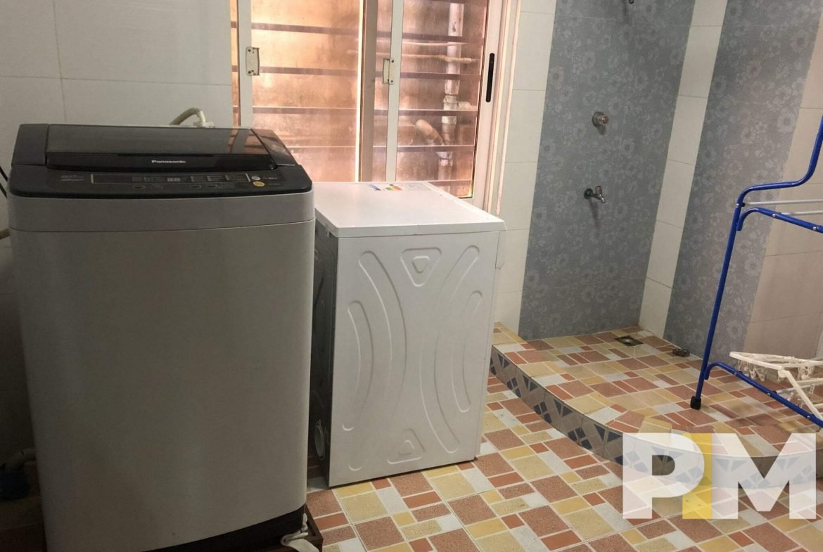 laundry room with washing machine - Real Estate in Yangon