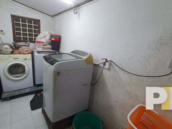 laundry room with washing machine - Real Estate in Yangon