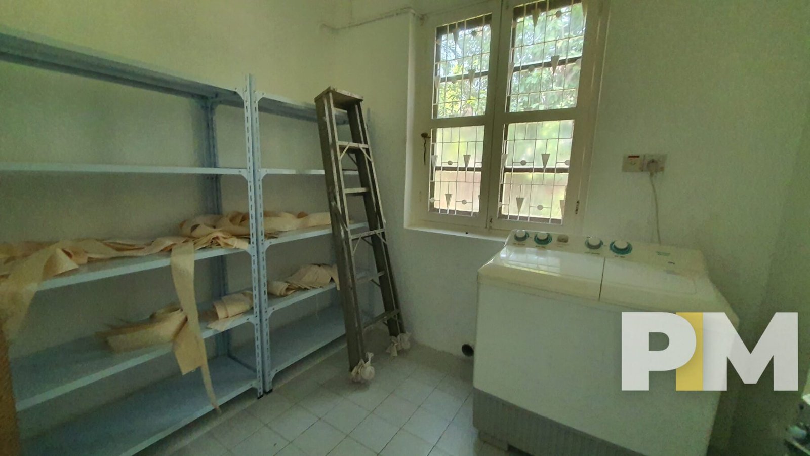 laundry room with washing machine - Yangon Real Estate