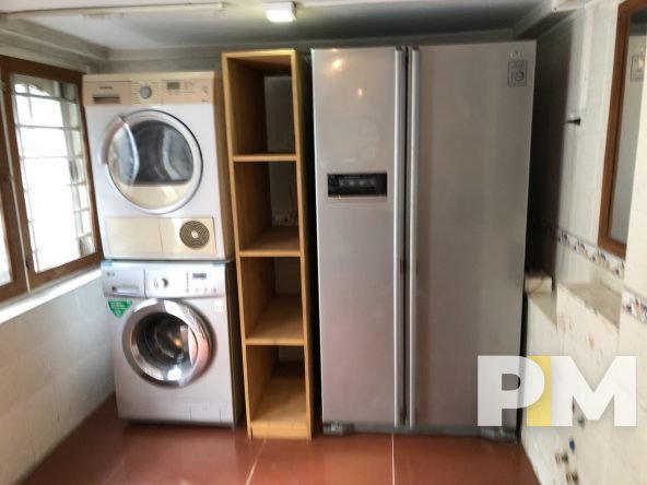 laundry room with washing machine - Yangon Real Estate